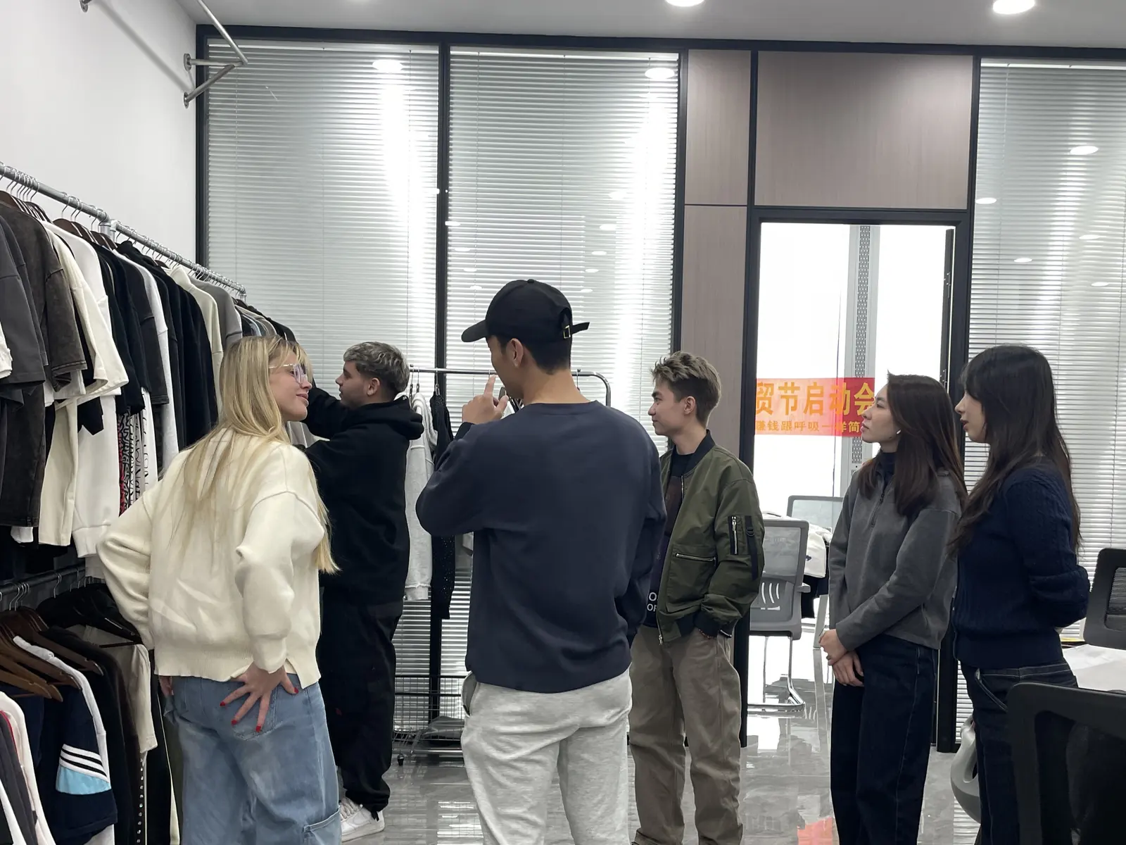 Pattern maker reviewing a sample — RUIXING Sportswear